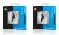 Sluchátka značek Sennheiser a Adidas v prodejních obalech