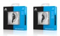 Sluchátka značek Sennheiser a Adidas v prodejních obalech