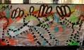 Miko maluje s použitím motivů Keitha Haringa