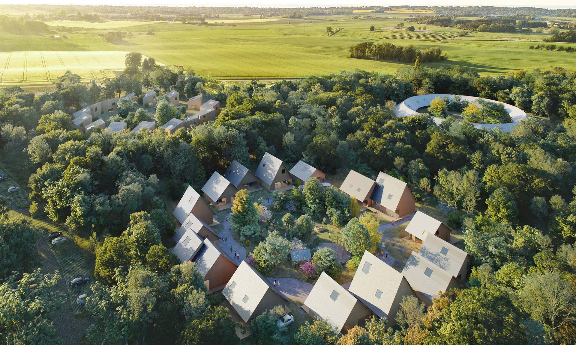 Dánsko postaví obytnou čtvrť nového typu s domy do kruhu a obklopené lesem