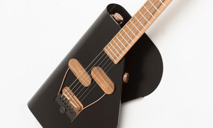 Verso Instruments vyrábí stylové elektrické kytary z ohnutého plechu a dřeva