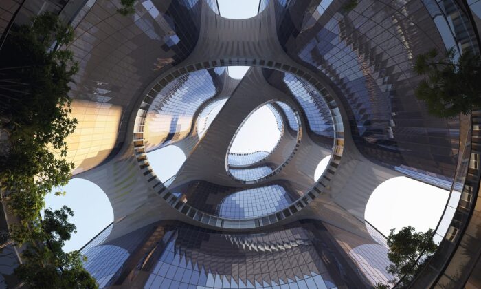Zaha Hadid Architects staví vertikálně rozdělený a mosty spojený mrakodrap pro Taikang