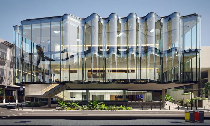 Snøhetta staví Queensland Performing Arts Centre s rozvlněnou skleněnou fasádou ve tvaru opony